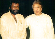 Rajan with Ustad Amjad Ali Khan
